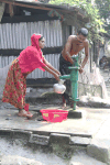 Pumping Water Village Well