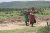 Women Carrying Wood